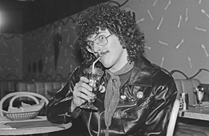Al sipping a refreshing drink in the I Love Rocky Road music video, 1983